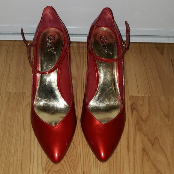 carlos santana red heels